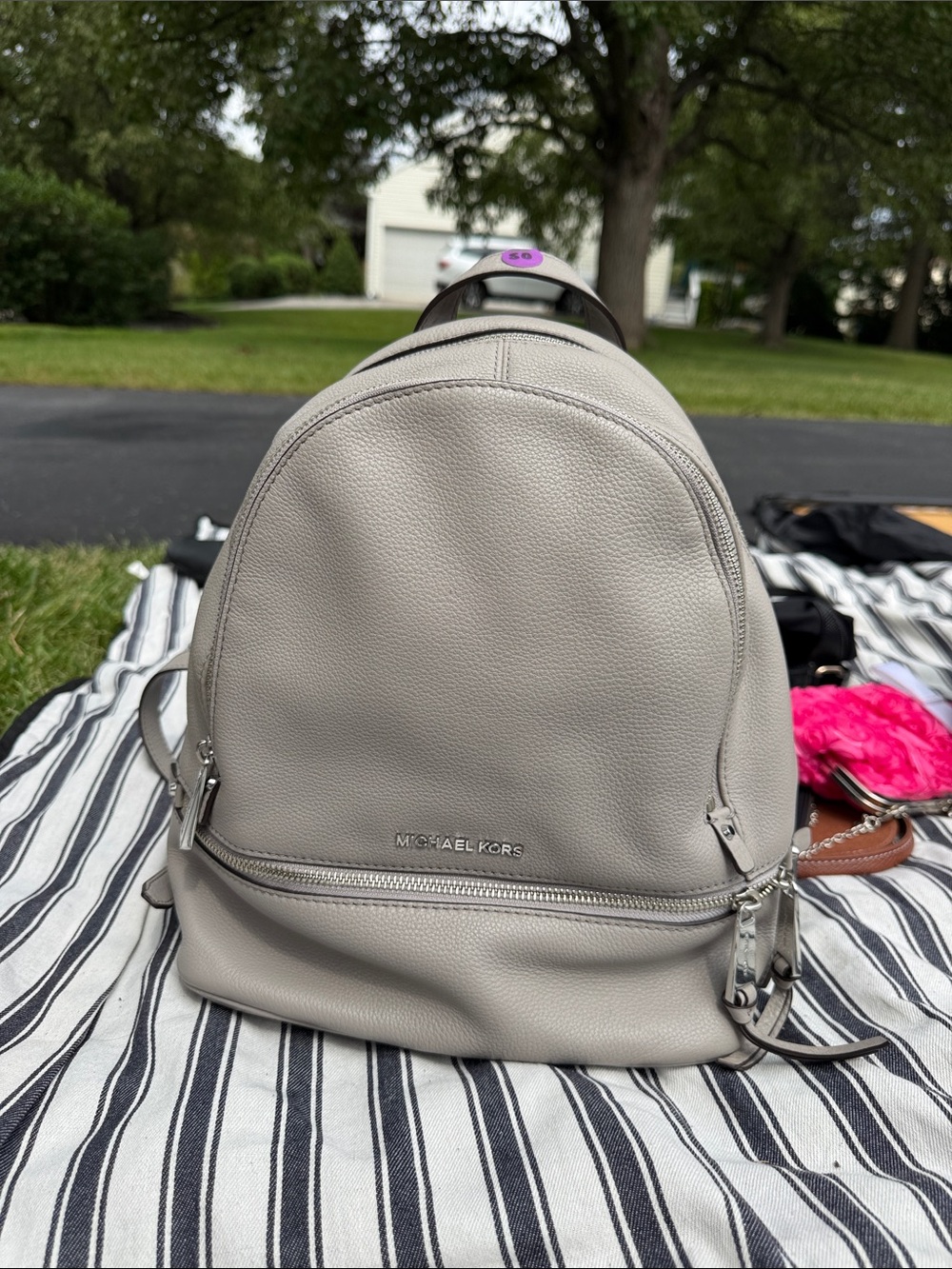 Michael Kors Pebbled Leather Backpack w/ adjustable strap in Light Gray